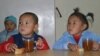 One Kyrgyz villager told RFE/RL that he had to bribe an official at the social-welfare department that registered his kids for child-benefit payments. (illustrative photo)