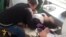 WATCH: Twelve high-school students suddenly fell ill at a school in the western Kazakh village of Berezovka on January 21 in the latest cases of unexplained illness there. (RFE/RL's Kazakh Service)