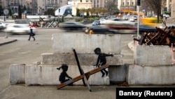 Одно из граффити Бэнкси в Киеве, ноябрь 2022