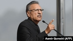 The law was put forward by Pakistani President Arif Alvi and is widely seen as a move to bolster protection for the country's institutions, including the military, from possible criticism. (file photo)