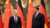 شی جین پینگ، رئیس‌جمهور چین (راست ) و اولاف شولتز، صدراعظم آلمان، در تالار بزرگ پکن