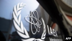 Офис ООН с вывеской Международного агентства по атомной энергии в штаб-квартире МАГАТЭ в Вене 23 мая 2021 года. 