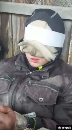 Даниил Воробьев в плену, кадр из видео