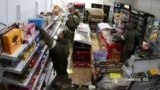 'Hungry' Russian Soldiers Loot Ukrainian Shops video grab 2