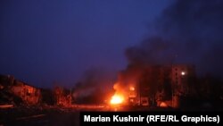 Fotografi ilustruese. Zjarr pas sulmeve ajrore në Ukrainë