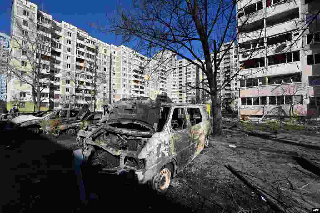 A view of cars destroyed by shelling on the outskirts of Kyiv on February 28.