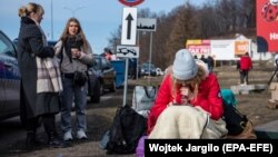 Беженцы из Украины на границе с Польшей. 