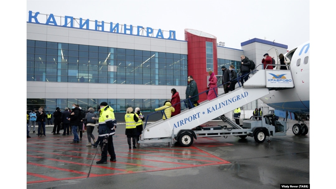 Passengers disembark a Boeing 737-800 plane operated by the Pobeda Airline at the Khrabrovo airport in Kaliningrad, Russia.