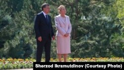 Uzbek President Shavkat Mirziyoev and Tatyana Karimova, the widow of former President Islam Karimov, attend the dedication of his mausoleum in Tashkent on August 31, 2017. It marked Karimova's last public appearance.