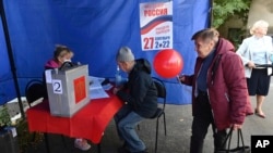 People from Ukraine's Donetsk and Luhansk regions vote at a temporary accommodation facility in Novocherkassk, Russia, on September 24.