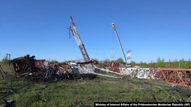 Two destroyed radio antennas lie on the ground in Maiac in Moldova's breakaway Transdniester region on April 25.