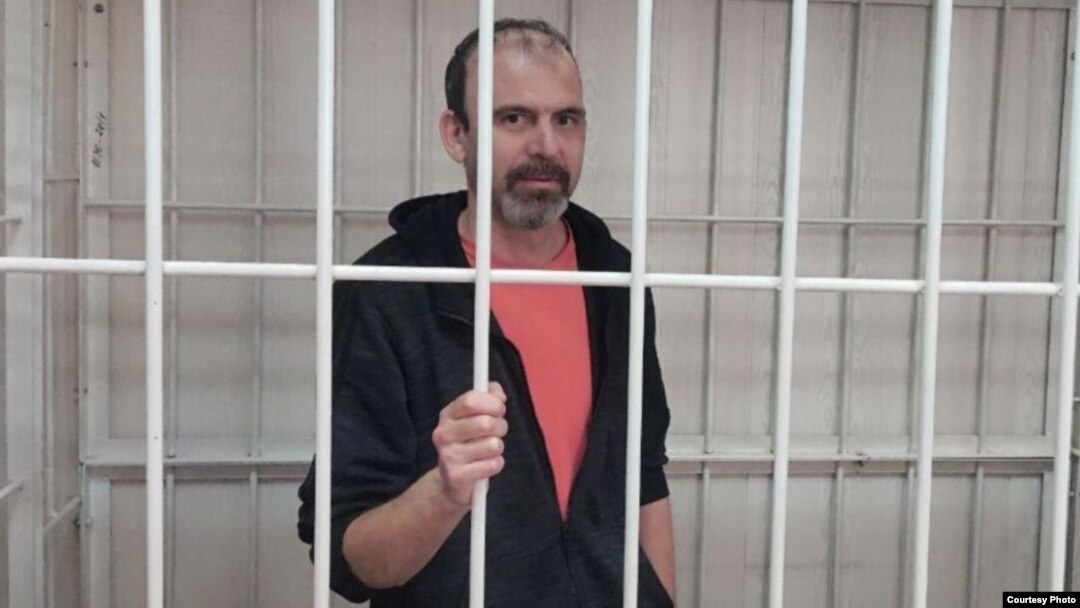 Mikhail Afanasyev attends a court session in Abakan in April 2022.