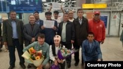 Ethnic Kazakh families from China's Xinjiang region arrive in Kazakhstan in April.