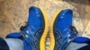 The man's lawyer says his client had nothing to do with the protest, but police detained him anyway, saying he was wearing "political tools" on his feet.