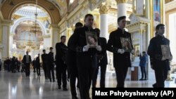 Похороны семьи Юрия Глодана