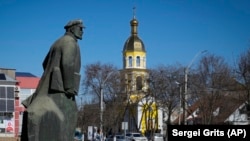 A monument to Vladimir Lenin stands in the center of Comrat in the former Soviet republic of Moldova. 