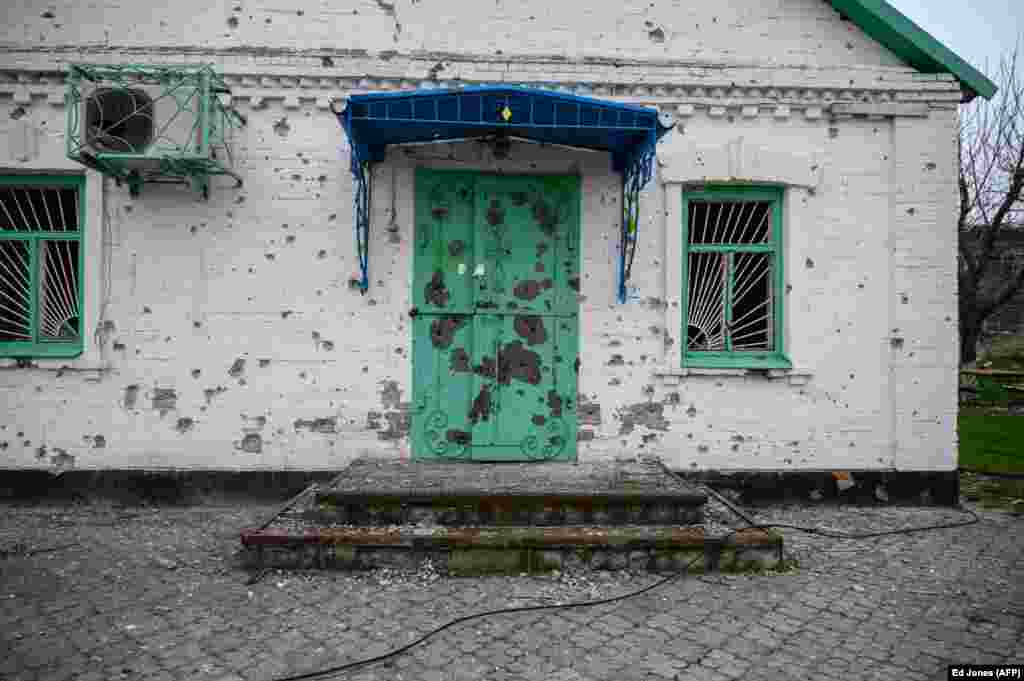 A house riddled with shrapnel in the village of Mala Tomachka, south of&nbsp;Zaporizhzhya, on April 19.&nbsp;