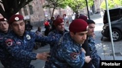 Armenia - Riot police arrest an opposition activist in Yerevan Yerevan, April 27, 2022