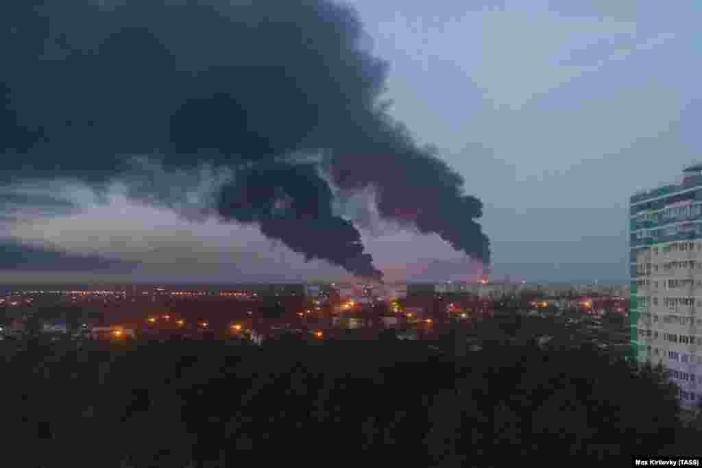 Smoke rises from an oil storage facility burning in the Russian region of Bryansk on April 25, just across the border from Ukraine.