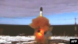 This grab made from handout video footage released by the Russian Defense Ministry on April 20 shows what it says is the launching of the Sarmat intercontinental ballistic missile at the Plesetsk testing field.