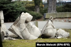 An illegally toppled Soviet monument is shown in a cemetery in Koszalin, northwestern Poland, on March 9.