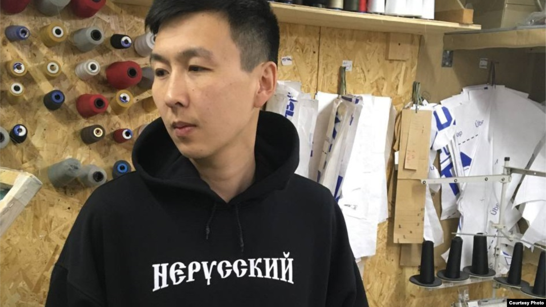 Aldar Eredzhenov models his "Non-Russian" brand.