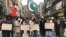 Shi'ite Muslims protest in Peshawar on March 6 after a suicide bomber killed 64 people at a mosque two days earlier. 