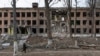 Разрушенное здание в окрестностях Киева, март 2022 года