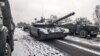 UKRAINE-RUSSIA-CONFLICT -- This video grab taken from a handout footage released by the Russian Defence Ministry on March 7, 2022 shows a purported Russian tank unit advancement in the Kyiv region.