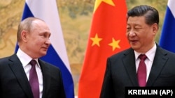 Președintele rus, Vladimir Putin, și cel chinez Xi Jinping | Rusia și China au votat împotriva unei propuneri a SUA de sancționare a Coreei de Nord. 