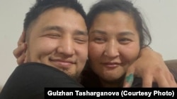 Miras Tasharghanov, pictured here with his mother, Gulzhan Tasharghanova, thought he was going to be working in a Russian meat-processing plant. Instead he ended up in Ukraine with the Russian Army.  