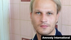 Gay-rights activist Ihar Tsikhanyuk says police dragged him out of the hospital where he was undergoing treatment for a stomach ulcer and took him to a police station, where he was repeatedly beaten, insulted, and grilled about his sexual life.