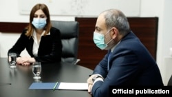 Armenia -- Prime Minister Nikol Pashinian introduces Armenia's newly appointed Health Minister Anahit Avanesian (L) to senior Ministry of Health officials, Yerevan, January 19, 2021.