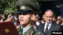 Armenian Defense Minister Seyran Ohanian (right) has personally pledged numerous times to strengthen army discipline in recent months.