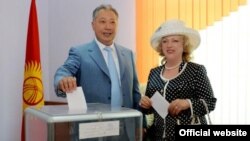 An official photo showing Kurmanbek Bakiev, who was president of Kyrgyzstan until he fled in 2010, and his wife Tatiana voting in the 2009 presidential election.