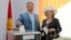 An official photo showing Kurmanbek Bakiev, who was president of Kyrgyzstan until he fled in 2010, and his wife Tatiana voting in the 2009 presidential election.