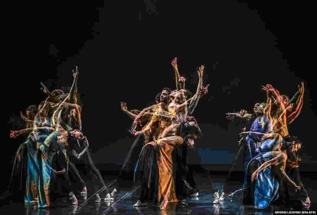Members of the Martha Graham Dance Company perform in a multiple exposure photo during the last evening of the Skopje Dance Fest 2022 in Skopje, North Macedonia.