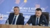 Kosovo's top prosecutor Blerim Isufaj (left) and Naim Abazi (right), who is the prosecutor of the Banjska attack case, address the media on September 11.