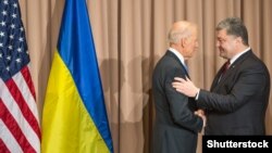 Ukrainian President Petro Poroshenko (right)with U.S. Vice President Joe Biden on the sidelines of the World Economic Forum in Davos last month. 