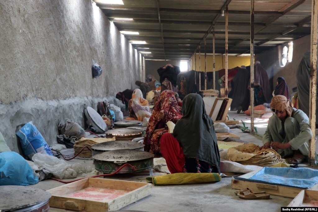 Women work inside a bakery run by a charity in the southern Afghan city of Kandahar.