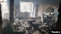Наслідки обстрілу в житловому будинку в Миколаєві, 7 березня 2022 року