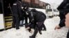 UKRAINE-CRISIS/RUSSIA-PROTESTS/A person is detained during an anti-war protest, following Russia's invasion of Ukraine, in Yekaterinburg, Russia March 6, 2022. 