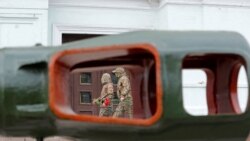 Članovi proruskih separatističkih snaga idu na sahranu Vladimira Zhoge, komandanta bataljona Sparta, 7. mart