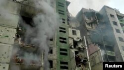 Një ndërtesë e shkattërruar pas sulmit të forcave ruse. 