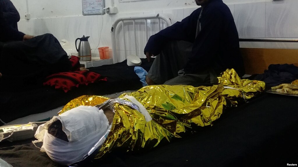 An Afghan boy receives treatment at a hospital after an air strike in Helmand Province on November 28.