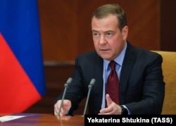 Dmitry Medvedev speaks to a meeting via video link from his Gorki residence on April 19.