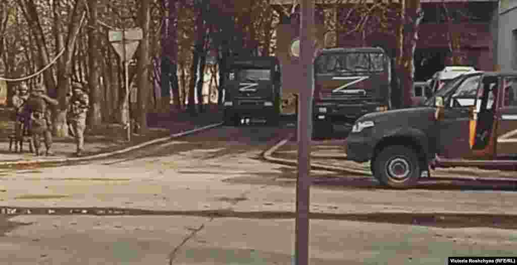 Russian troops patrol near the Kherson Regional State Administration. &quot;All thinking Kherson residents are for Ukraine, of course,&quot; one local resident told RFE/RL. &quot;But now there is some uncertainty -- and this gives rise to fear. You don&#39;t know what will happen tomorrow.&quot;