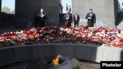 Armenia - President Vahagn Khachaturian (left), Prime Minister Nikol Pashinian and other officials visit the Armenian genocide memorial in Yerevan, April 24, 2022.
