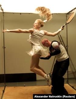 Kulik installs a wax figure resembling Russian tennis star Anna Kournikova at an exhibition in Moscow in 2002.