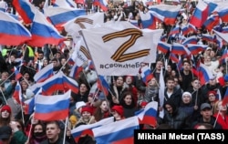 18 марта 2022 года. Участники на митинге-концерте «Крымская весна» на стадионе «Лужники» в честь восьмой годовщины «воссоединения Крыма с Россией».